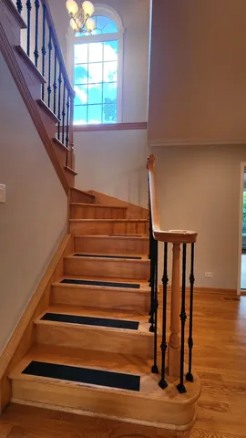 a view of entryway with wooden floor