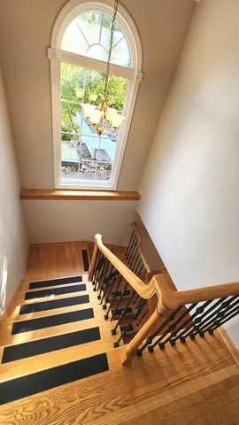a bathroom with a tub a sink and a shower