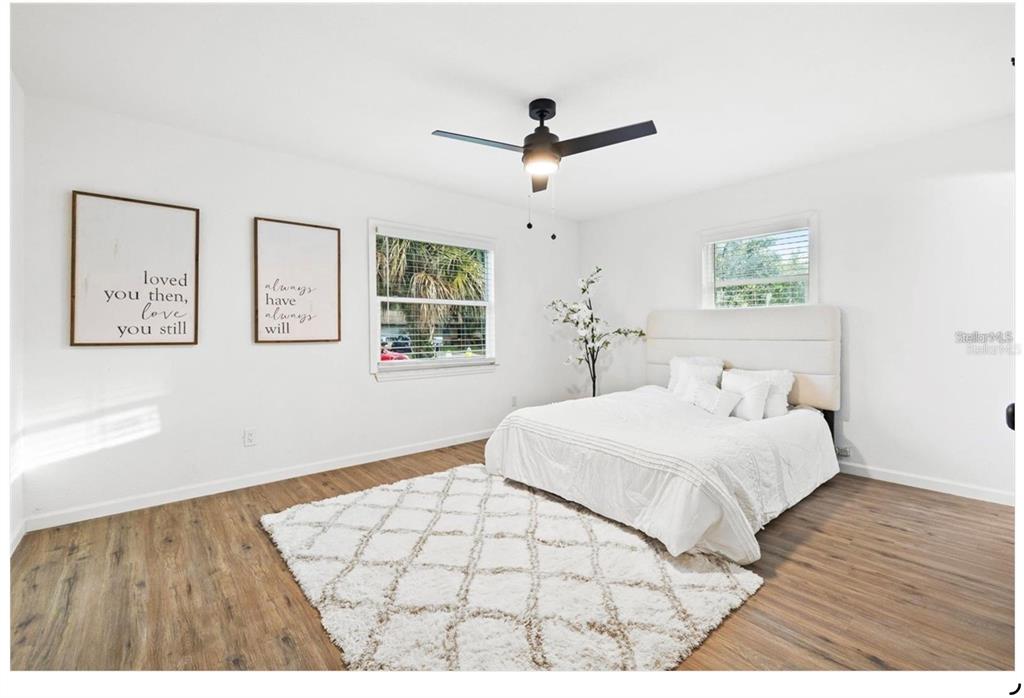 508 Brooker Road Brandon, FL 33511 - Photo 12 of 18 a bedroom with a large bed and a window