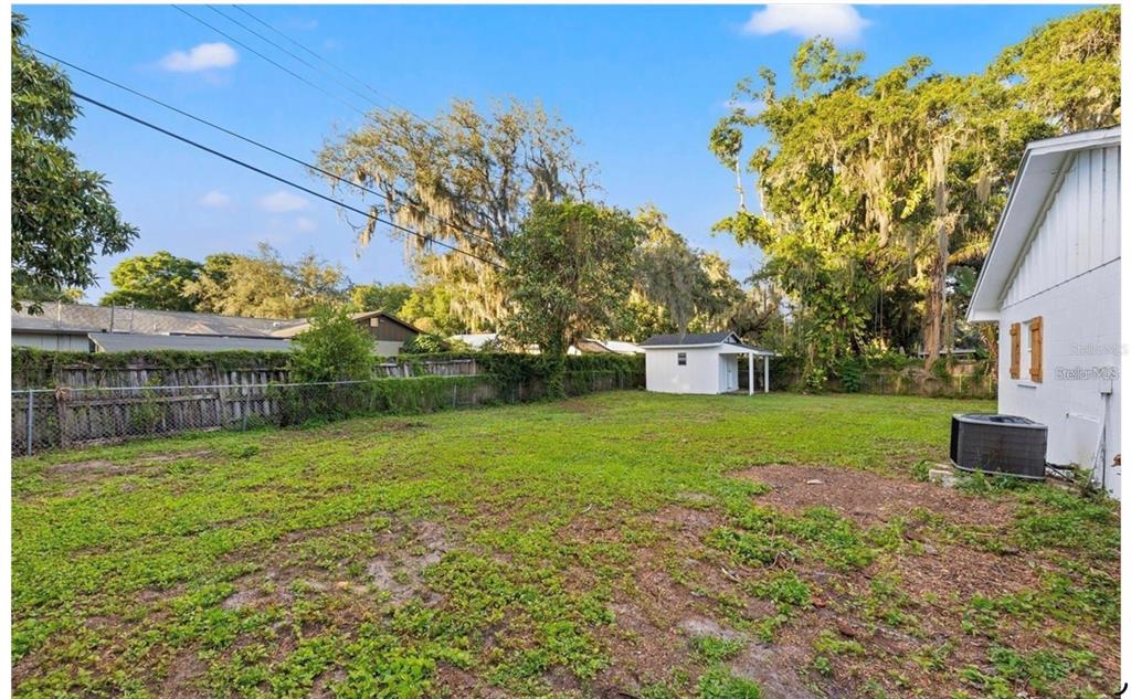 508 Brooker Road Brandon, FL 33511 - Photo 17 of 18 a view of a house with a yard