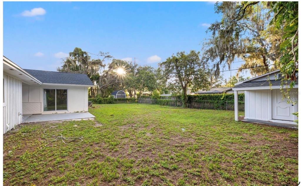 508 Brooker Road Brandon, FL 33511 - Photo 18 of 18 a view of a house with backyard and garden