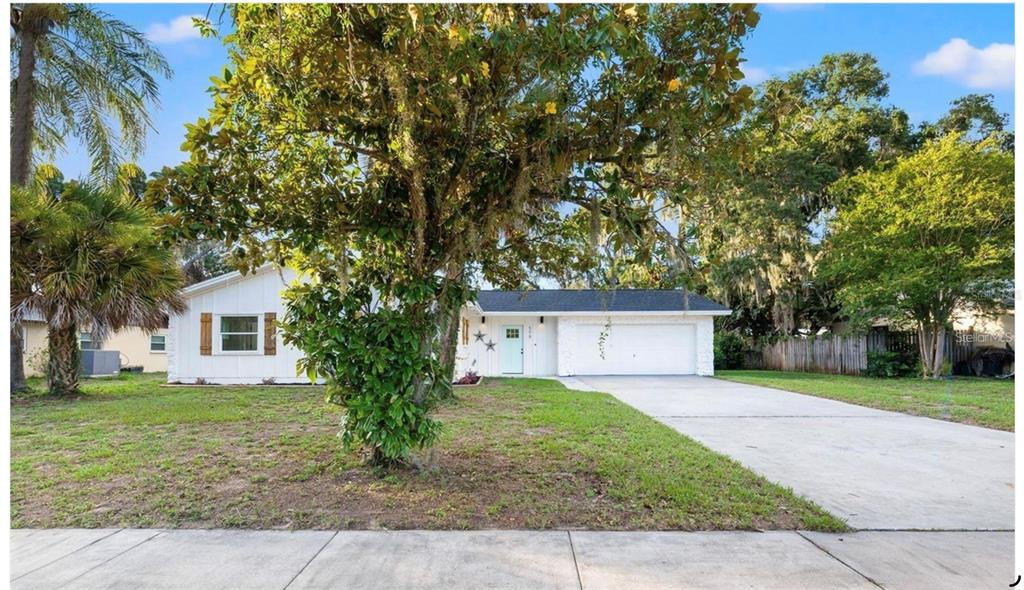 508 Brooker Road Brandon, FL 33511 - Photo 2 of 18 front view of house with a yard