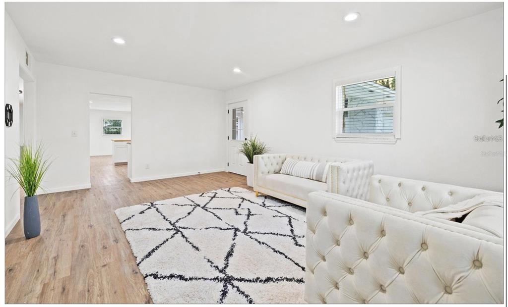508 Brooker Road Brandon, FL 33511 - Photo 4 of 18 a living room with furniture and wooden floor