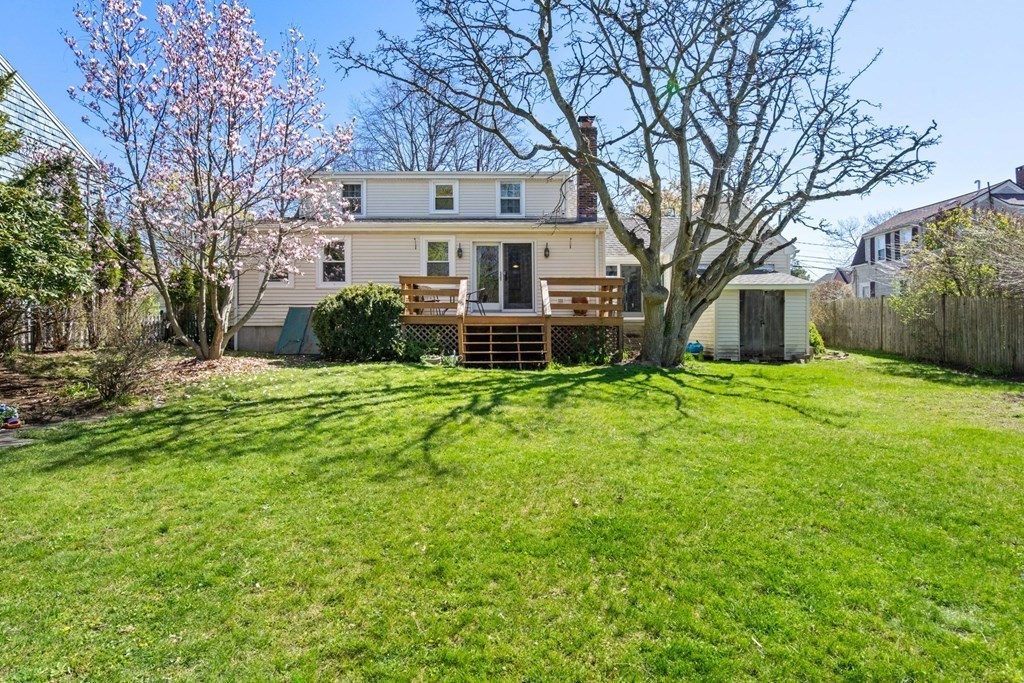 265 Riverside Drive Dedham, MA 02026 - Photo 36 of 41 a front view of house with yard and green space