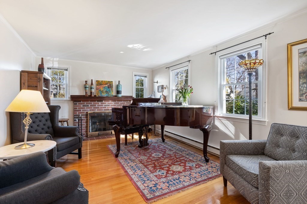 265 Riverside Drive Dedham, MA 02026 - Photo 4 of 41 a living room with furniture and a rug