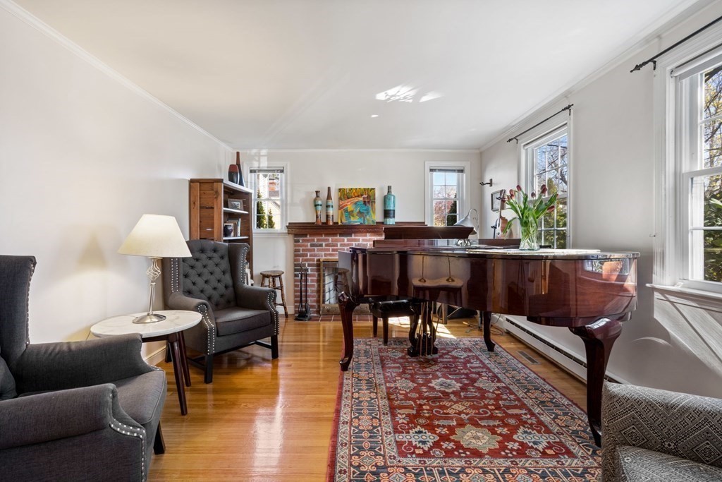 265 Riverside Drive Dedham, MA 02026 - Photo 5 of 41 a living room with furniture and a rug