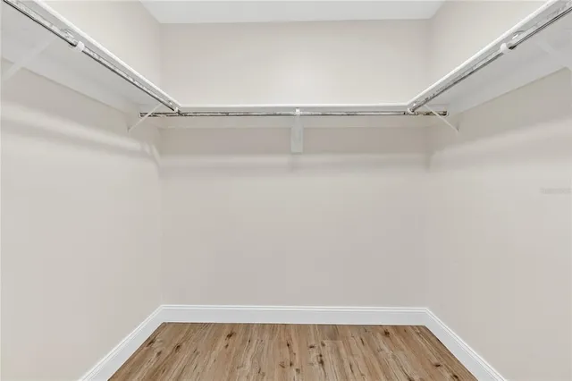 a view of an empty walk in closet