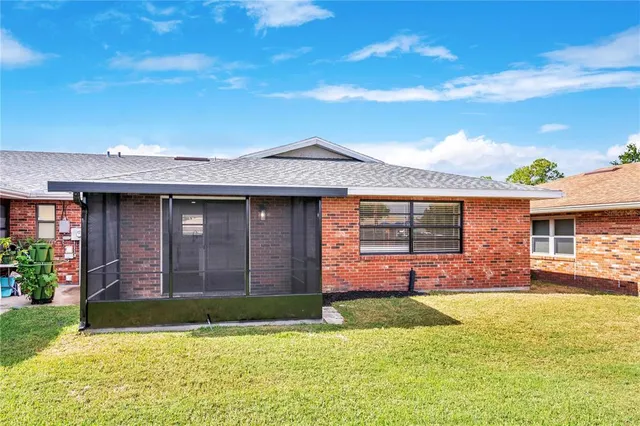 a view of a house with a swimming pool