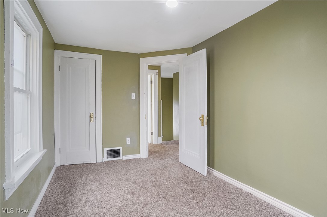 888 Dan Street Akron, OH 44310 - Photo 26 of 36 Unfurnished bedroom featuring light carpet