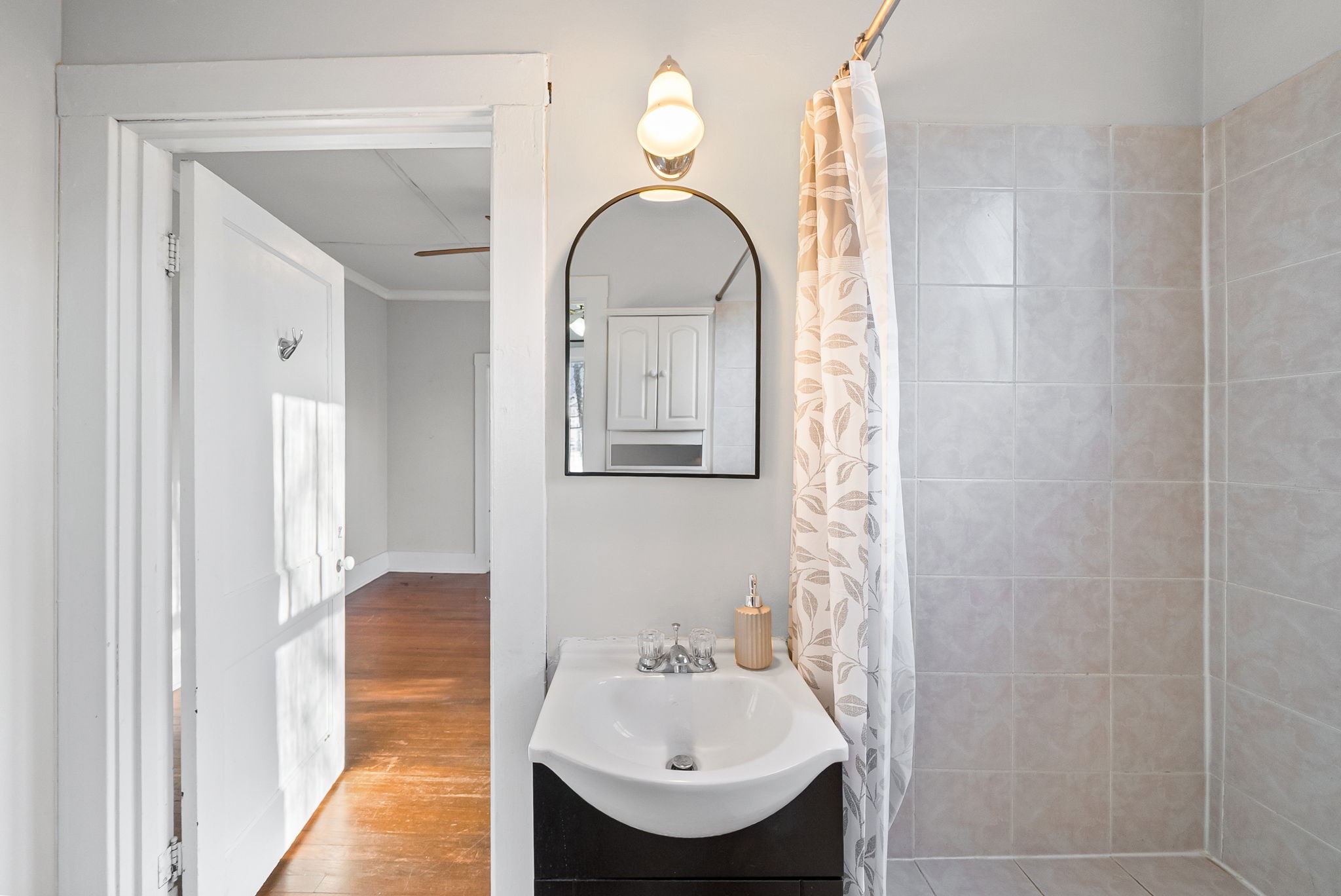 106 Cedar Street Dover, TN 37058 - Photo 15 of 32 a bathroom with a sink and a mirror
