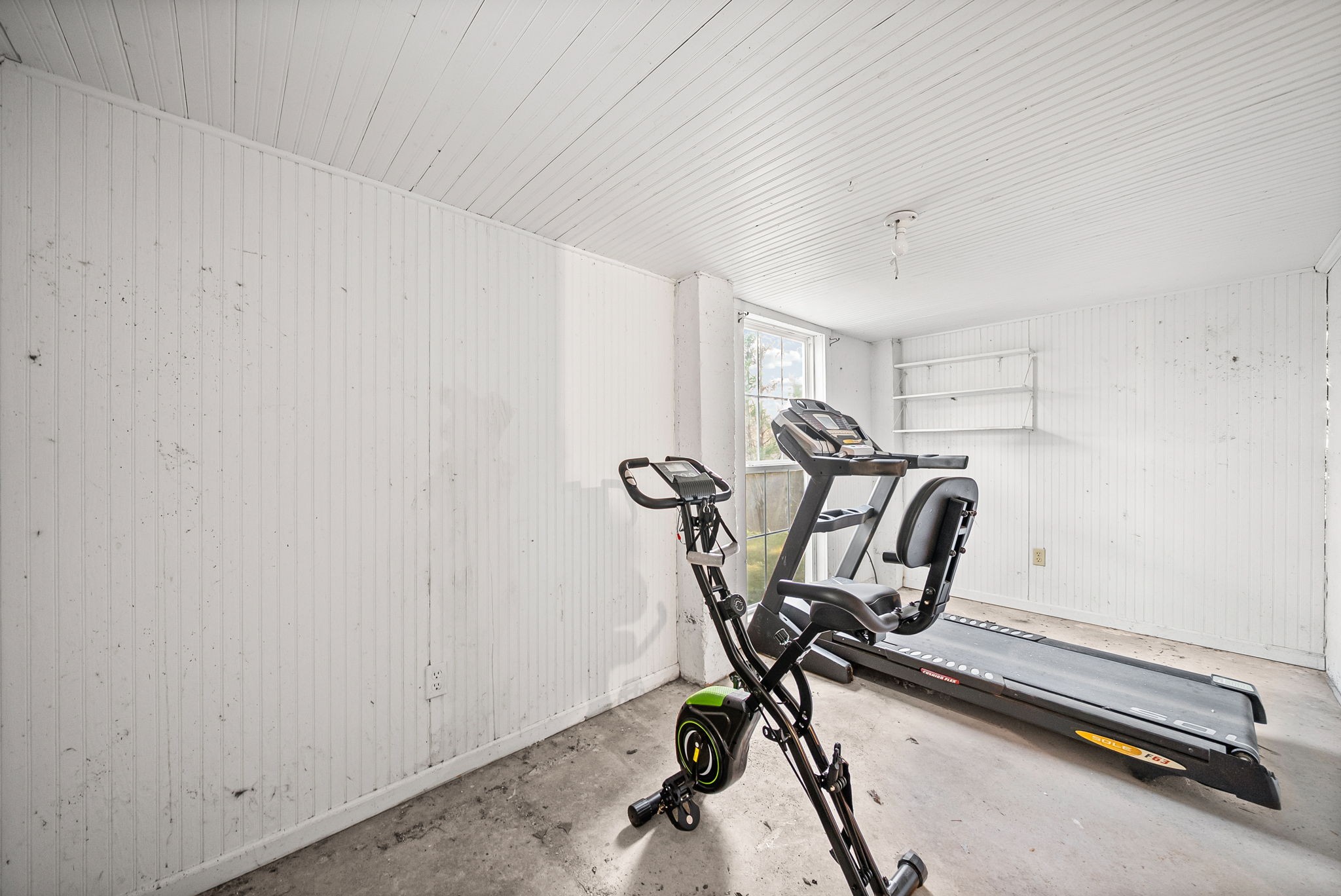 106 Cedar Street Dover, TN 37058 - Photo 22 of 32 a view of a workspace with furniture and a window