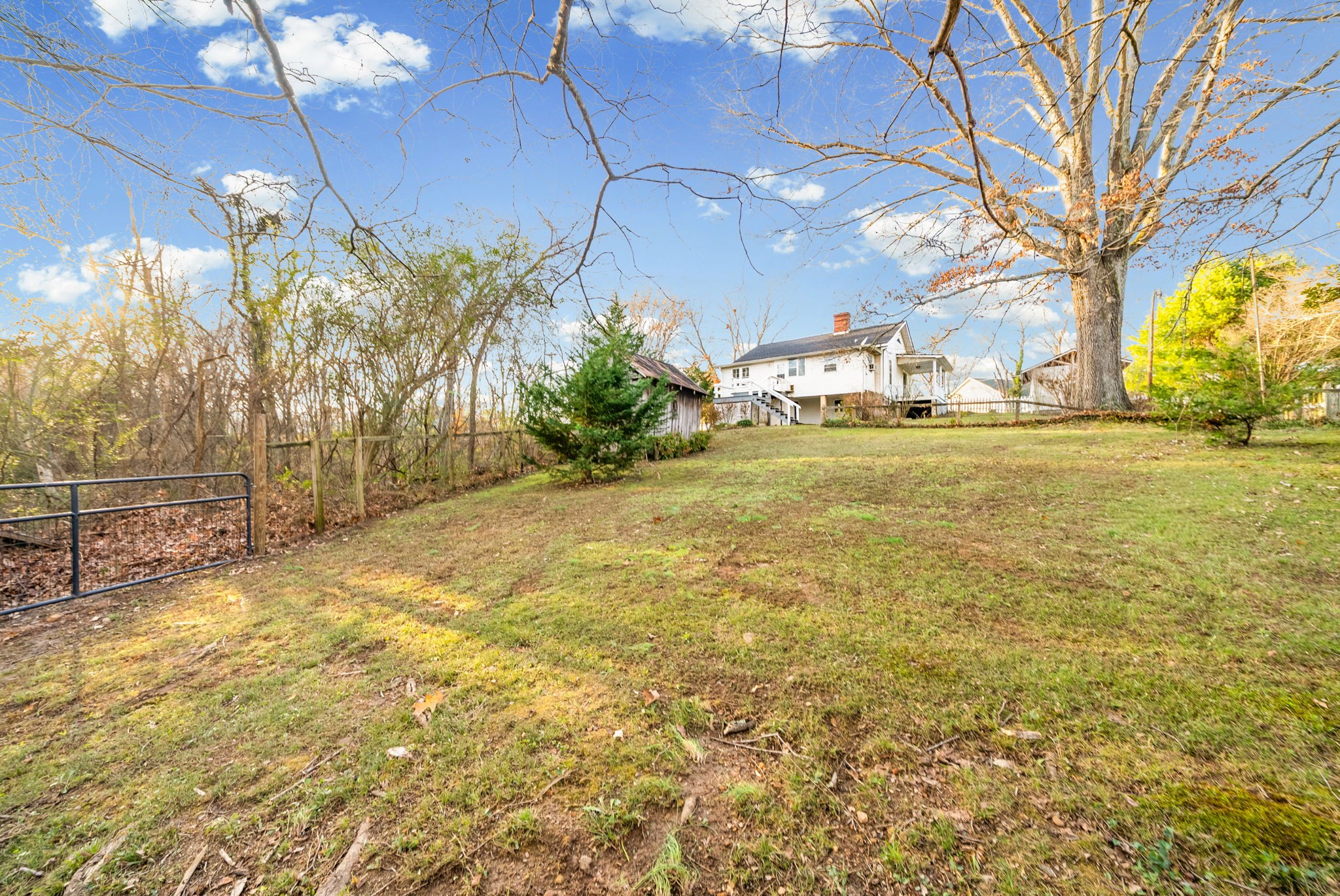 106 Cedar Street Dover, TN 37058 - Photo 29 of 32 a yellow building with trees in front of it