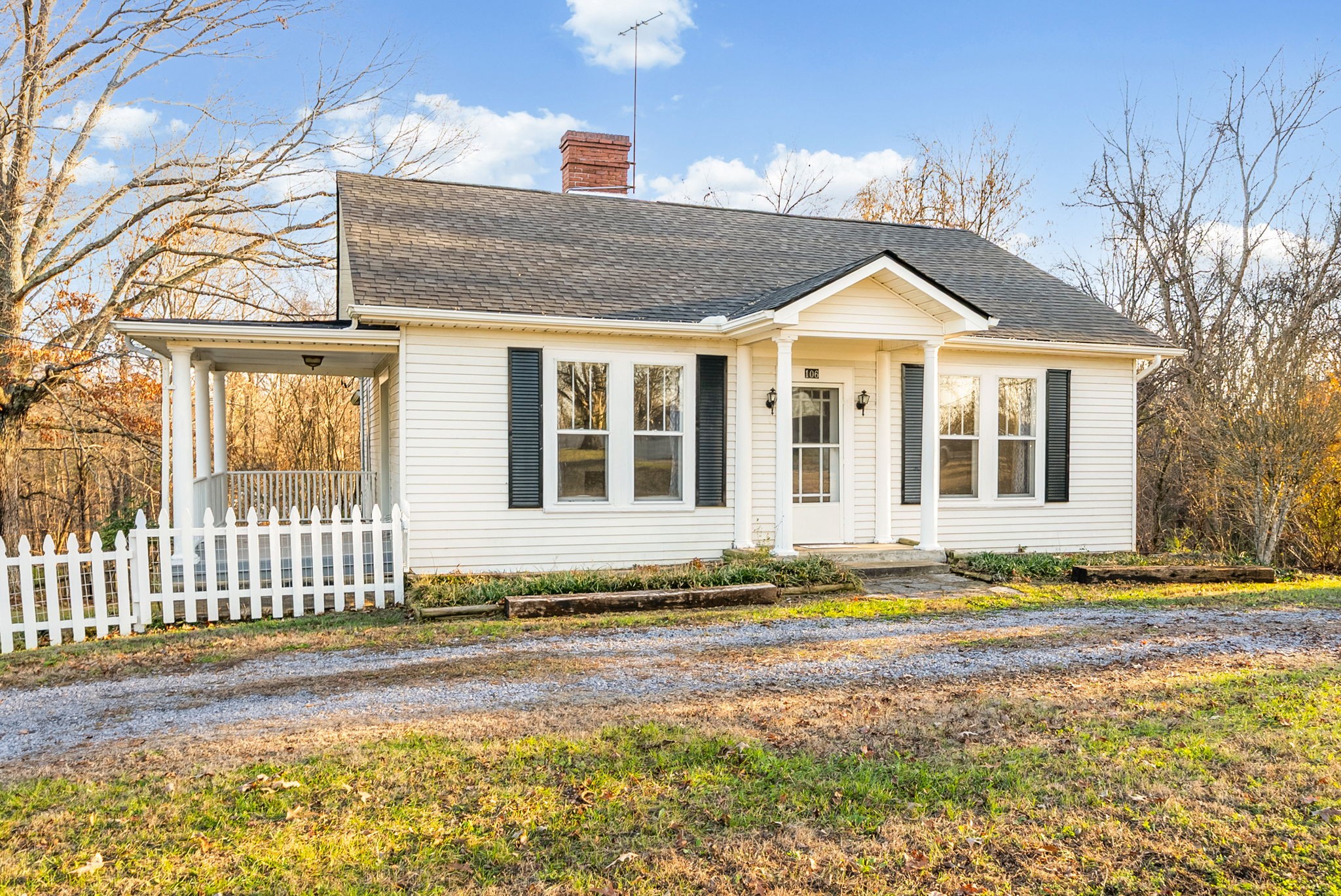 106 Cedar Street Dover, TN 37058 - Photo 30 of 32 a front view of a house with a yard