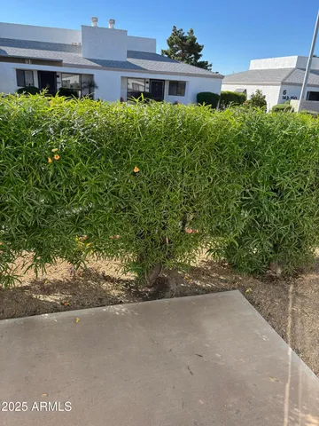 a view of a house with a street