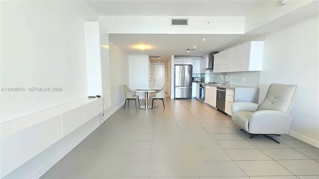 a living room with furniture and window