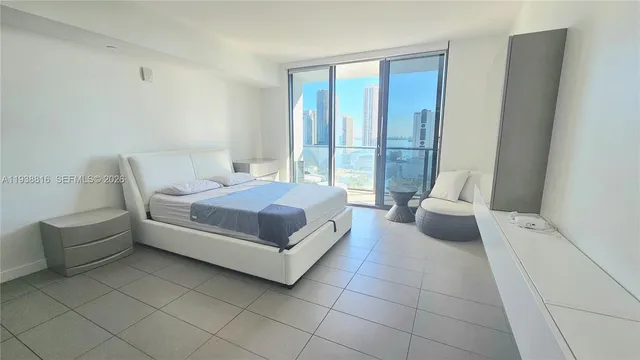 a bathroom with a sink toilet tub and shower