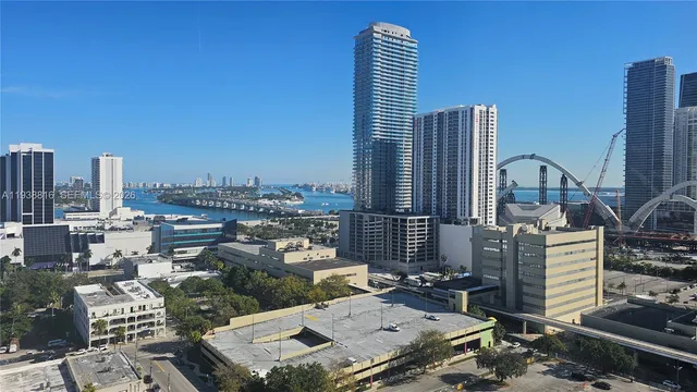 a view of a city with tall buildings