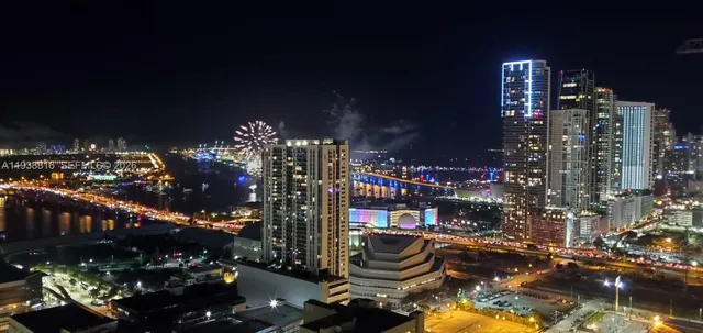 a stove top oven sitting inside of a kitchen
