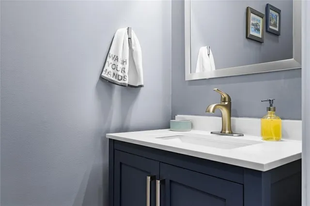 a bedroom with a bed and a lamp