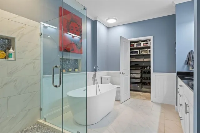a view of a hallway with washer and dryer