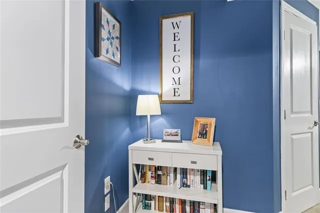 a view of a potted flower in front of a house