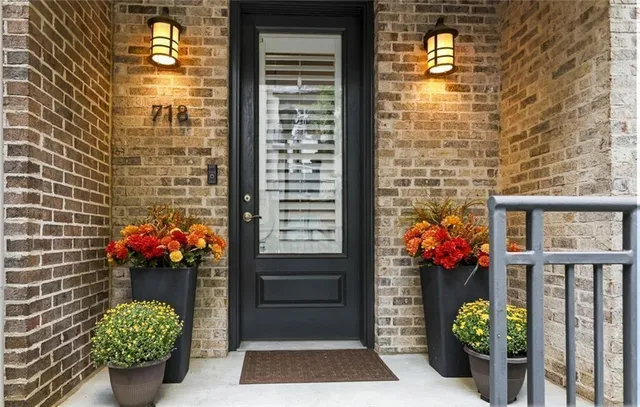 a view of staircase with white walls and windows
