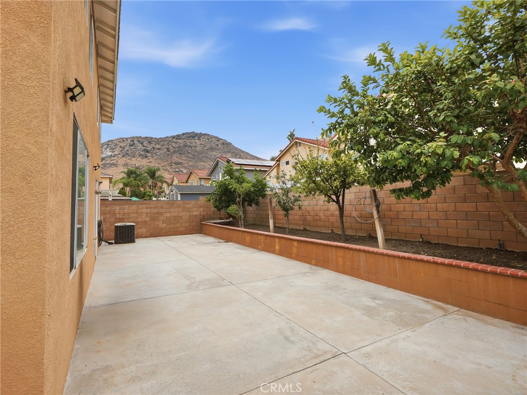 15689 Swan Road Fontana, CA 92337 - Photo 26 of 35 Backyard w/matured trees