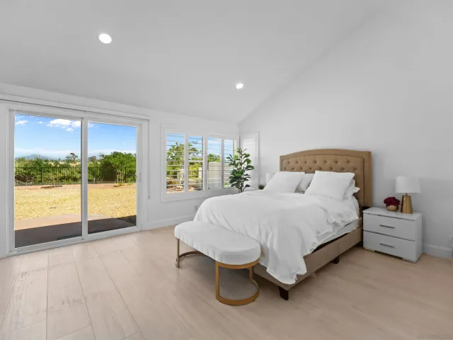 a bathroom with double sink and a mirror