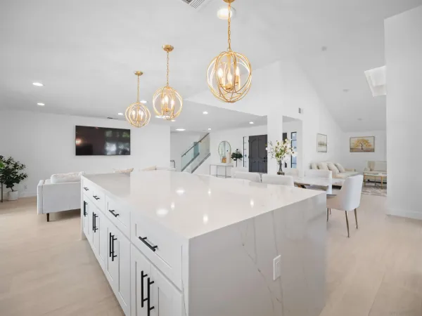 a stove top oven sitting inside of a kitchen