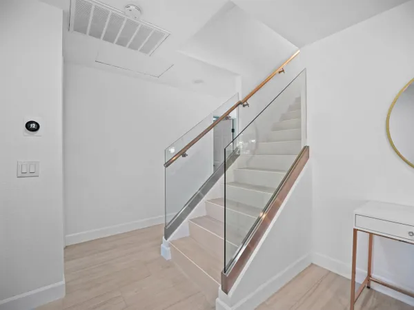 a view of entryway with wooden floor