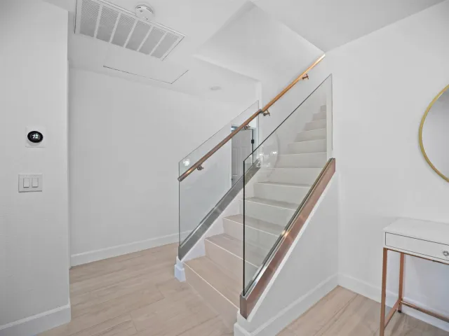 a view of entryway with wooden floor