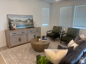 2796 West Aurora Avenue Mapleton, UT 84664 - Photo 4 of 8 Living area with baseboards and light wood-style floors