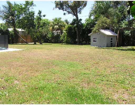 3573 Northwest 4th Avenue Boca Raton, FL 33431 - Photo 3 of 16 a house view with a outdoor space