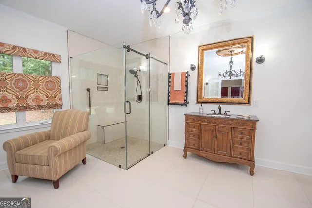 a view of a bedroom with wooden floor and closet