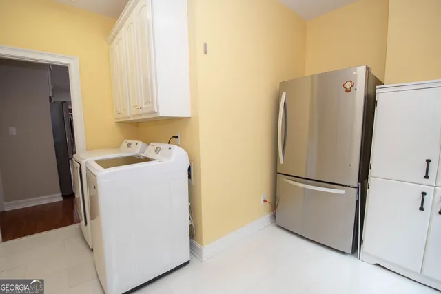 a view of a house with a yard porch and sitting area