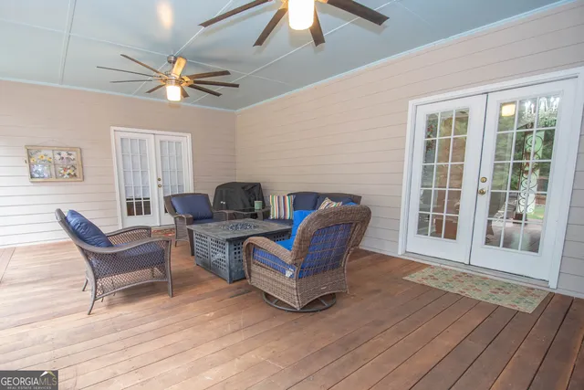 an aerial view of a house with outdoor space