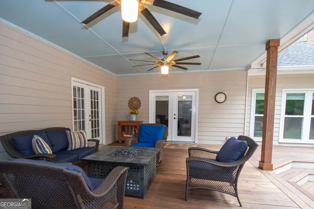 a bathroom with a sink a mirror and bathtub
