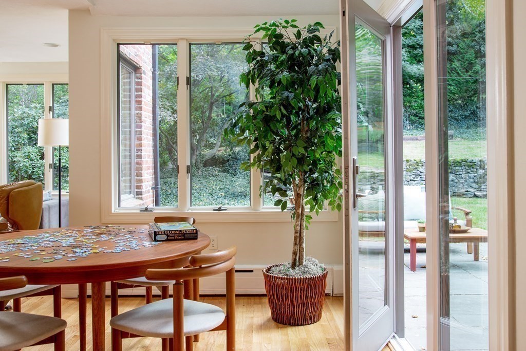 122 Clark Road Brookline, MA 02445 - Photo 12 of 40 a view of a dining room with furniture and window