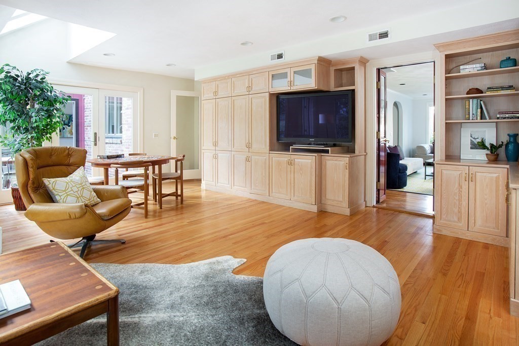 122 Clark Road Brookline, MA 02445 - Photo 13 of 40 a living room with furniture and a flat screen tv