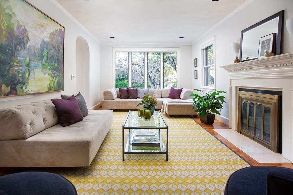 122 Clark Road Brookline, MA 02445 - Photo 14 of 40 a living room with furniture and a fireplace