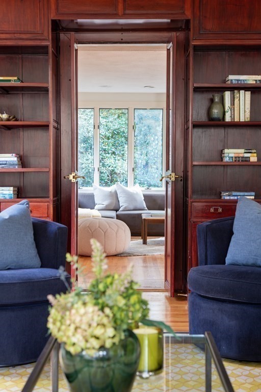 122 Clark Road Brookline, MA 02445 - Photo 16 of 40 a living room with furniture and a potted plant