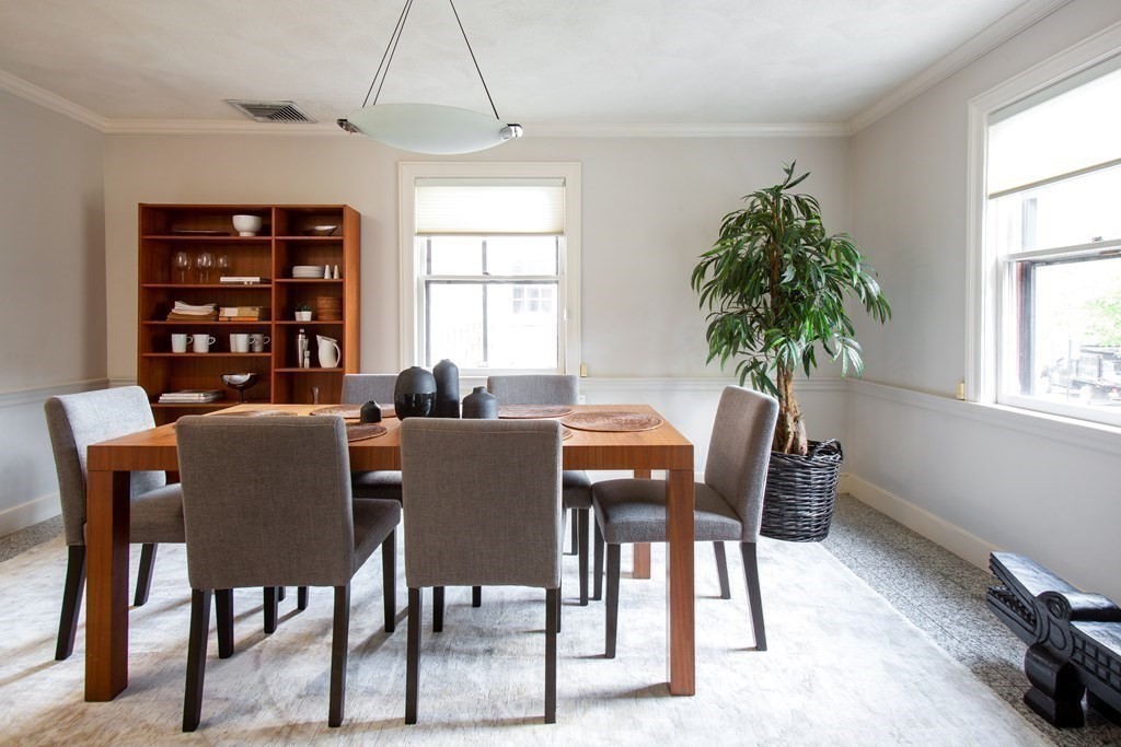 122 Clark Road Brookline, MA 02445 - Photo 19 of 40 a dining room with furniture and window