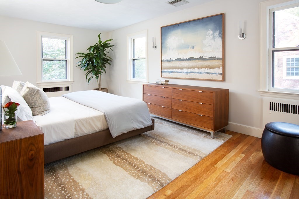 122 Clark Road Brookline, MA 02445 - Photo 24 of 40 a bedroom with a bed and a window