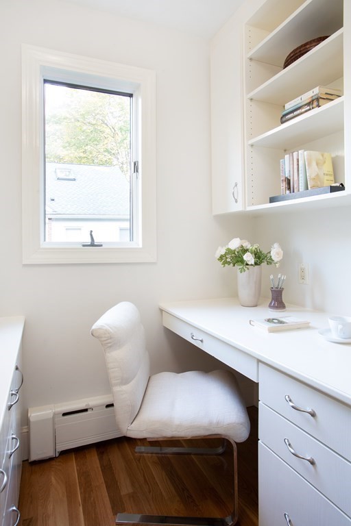 122 Clark Road Brookline, MA 02445 - Photo 25 of 40 a bedroom with a bed and a window