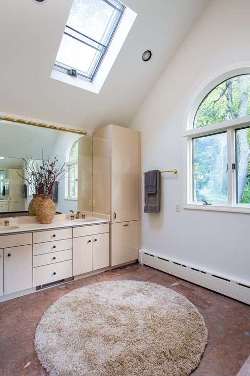 122 Clark Road Brookline, MA 02445 - Photo 27 of 40 a room with natural light and fireplace