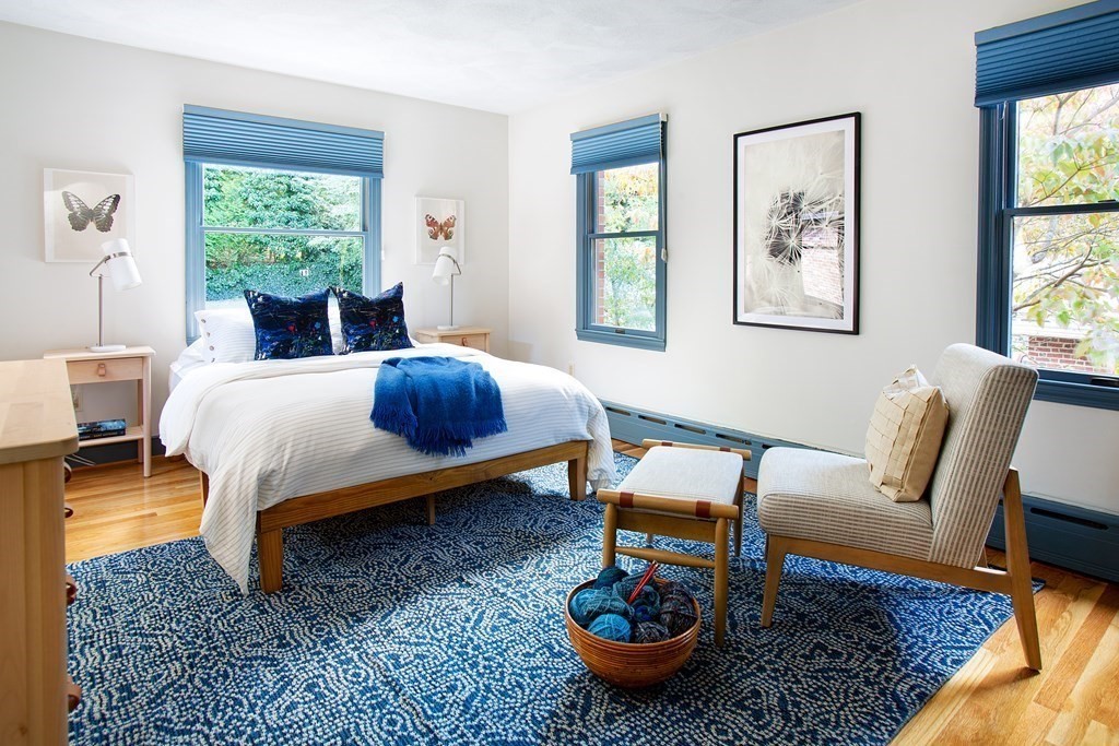 122 Clark Road Brookline, MA 02445 - Photo 28 of 40 a bed room with a bed and a chair