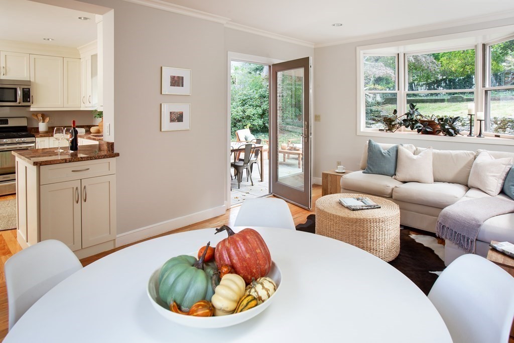 122 Clark Road Brookline, MA 02445 - Photo 3 of 40 a living room with furniture and a potted plant