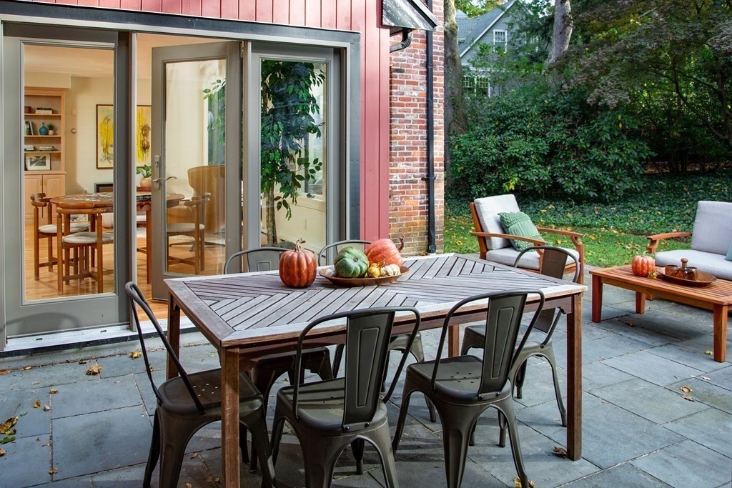 122 Clark Road Brookline, MA 02445 - Photo 35 of 40 a view of an outside dining space with furniture