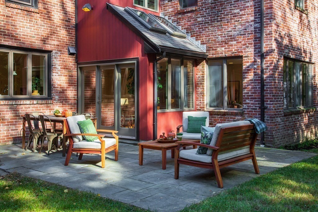 122 Clark Road Brookline, MA 02445 - Photo 37 of 40 a view of a patio with couple of chairs and a table