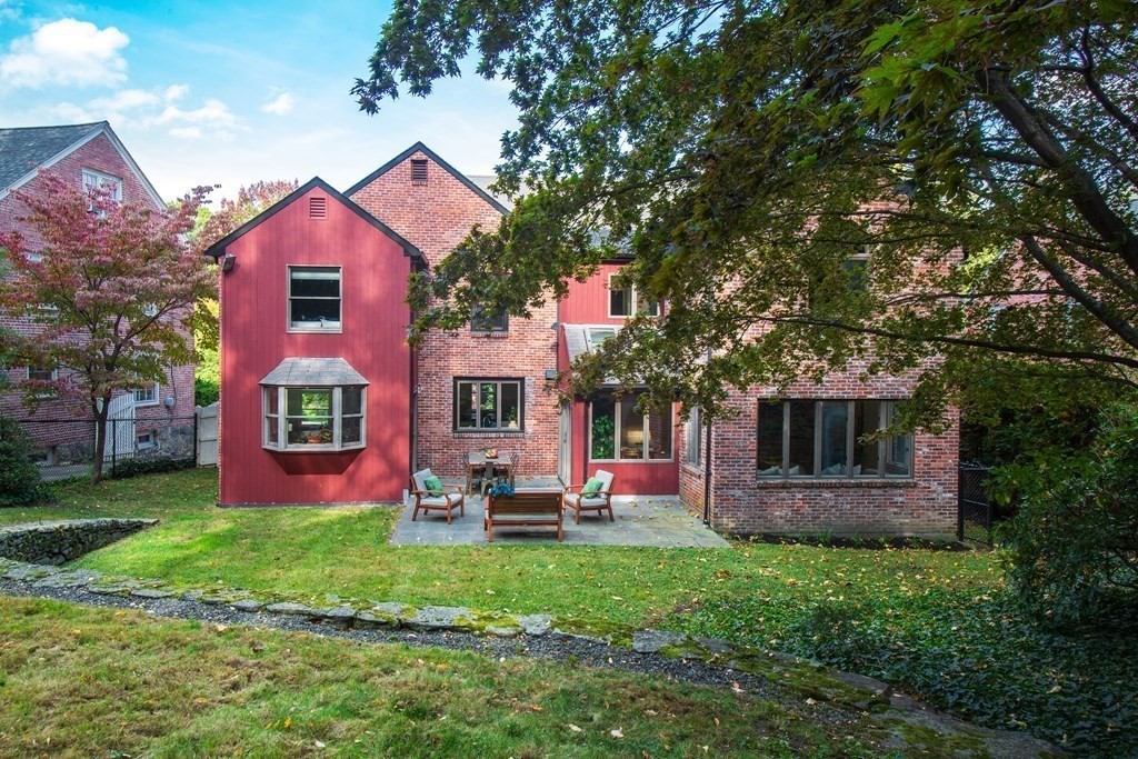 122 Clark Road Brookline, MA 02445 - Photo 38 of 40 a front view of house with yard and green space